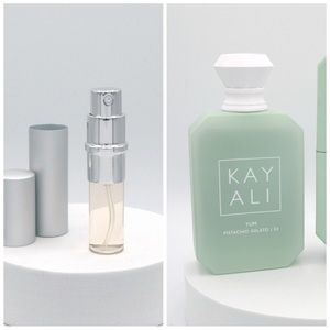 Kayali Yum Pistachio Gelato 33 5ml sample in refillable travel atomizer.